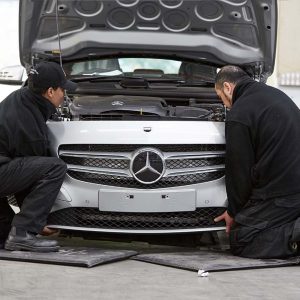 parramatta smash repair technicians fitting mercedes benz panel on